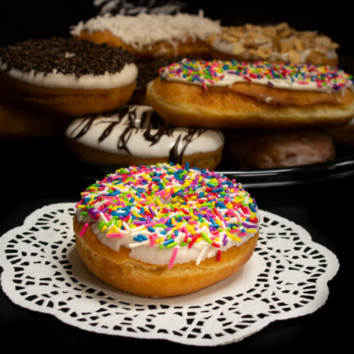 Chocolate Raised Ring Donuts with Chocolate Jimmies Prantl's Bakery